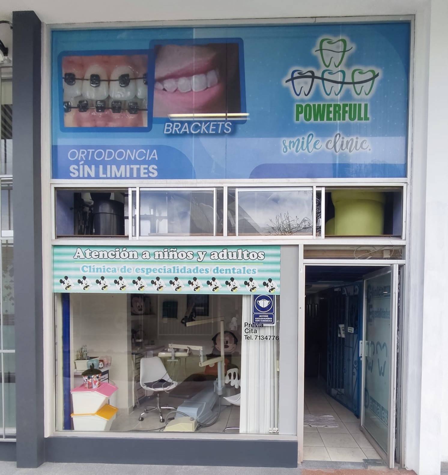 entrada a local comercial dentista